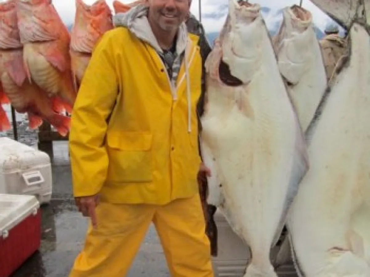 A happy guy and a hell of a catch!