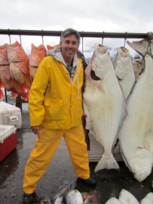 a man holding a fish