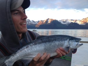 a man holding a fish