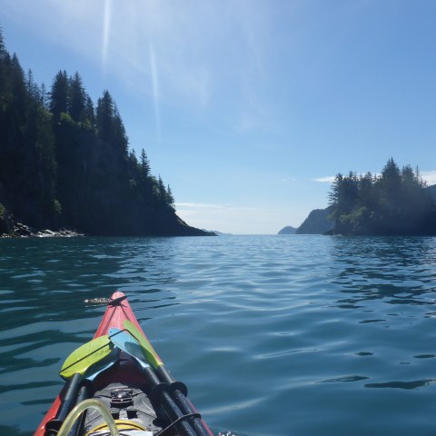 Kayaking in sunny waters near Seward, Alaska