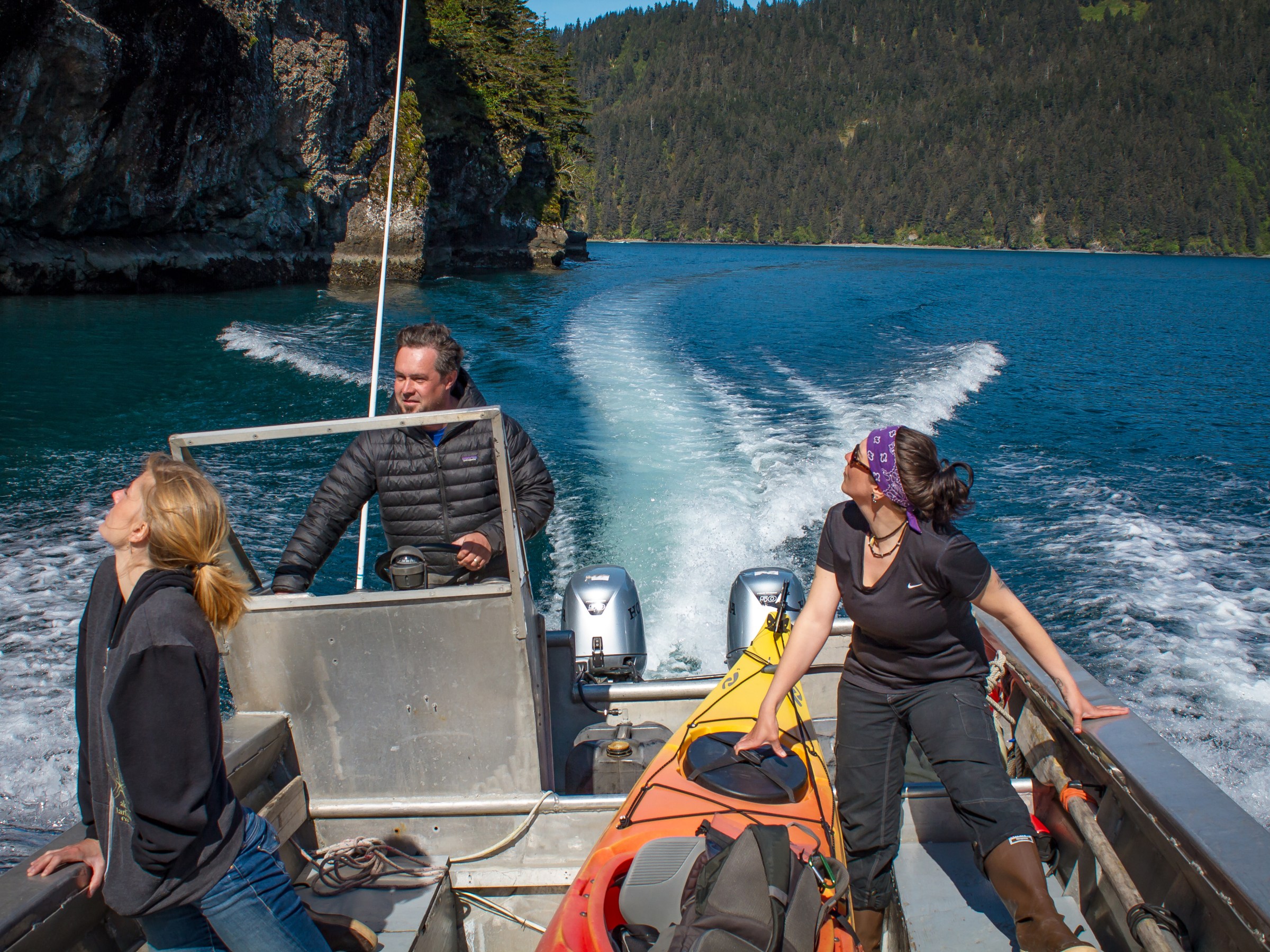 Capt. Tom Miller helming the water taxi to Thumb Cove in the Salty, Seward, AK