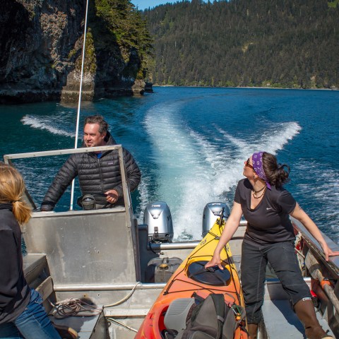 Capt. Tom Miller helming the water taxi to Thumb Cove in the Salty, Seward, AK