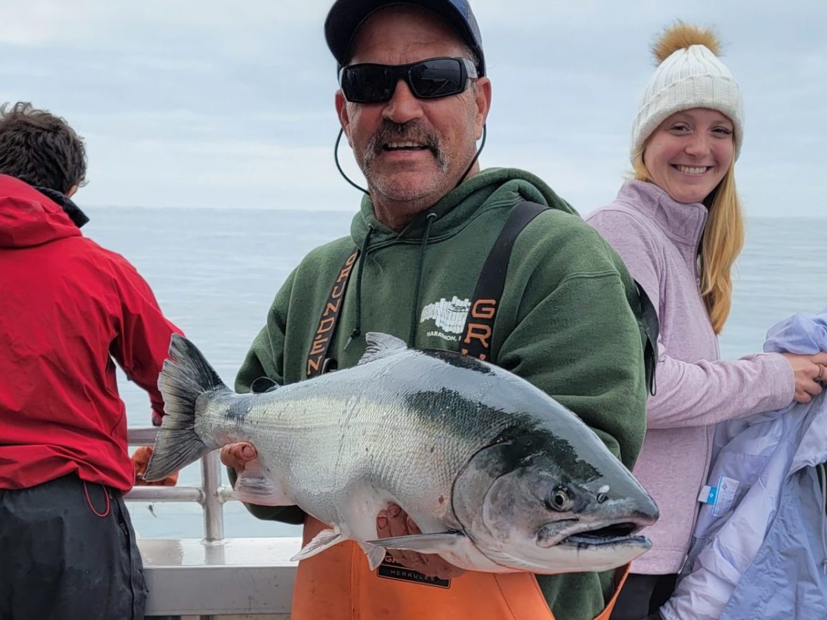 cpt bill holding a fish