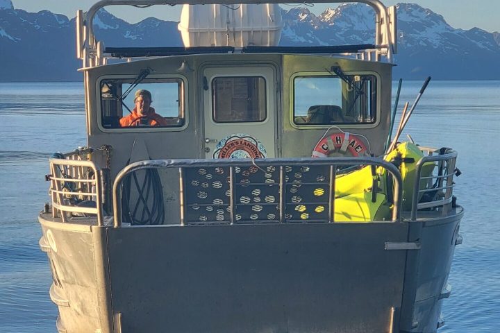 a small boat in a large body of water