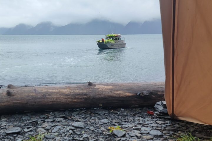 a small boat in a body of water