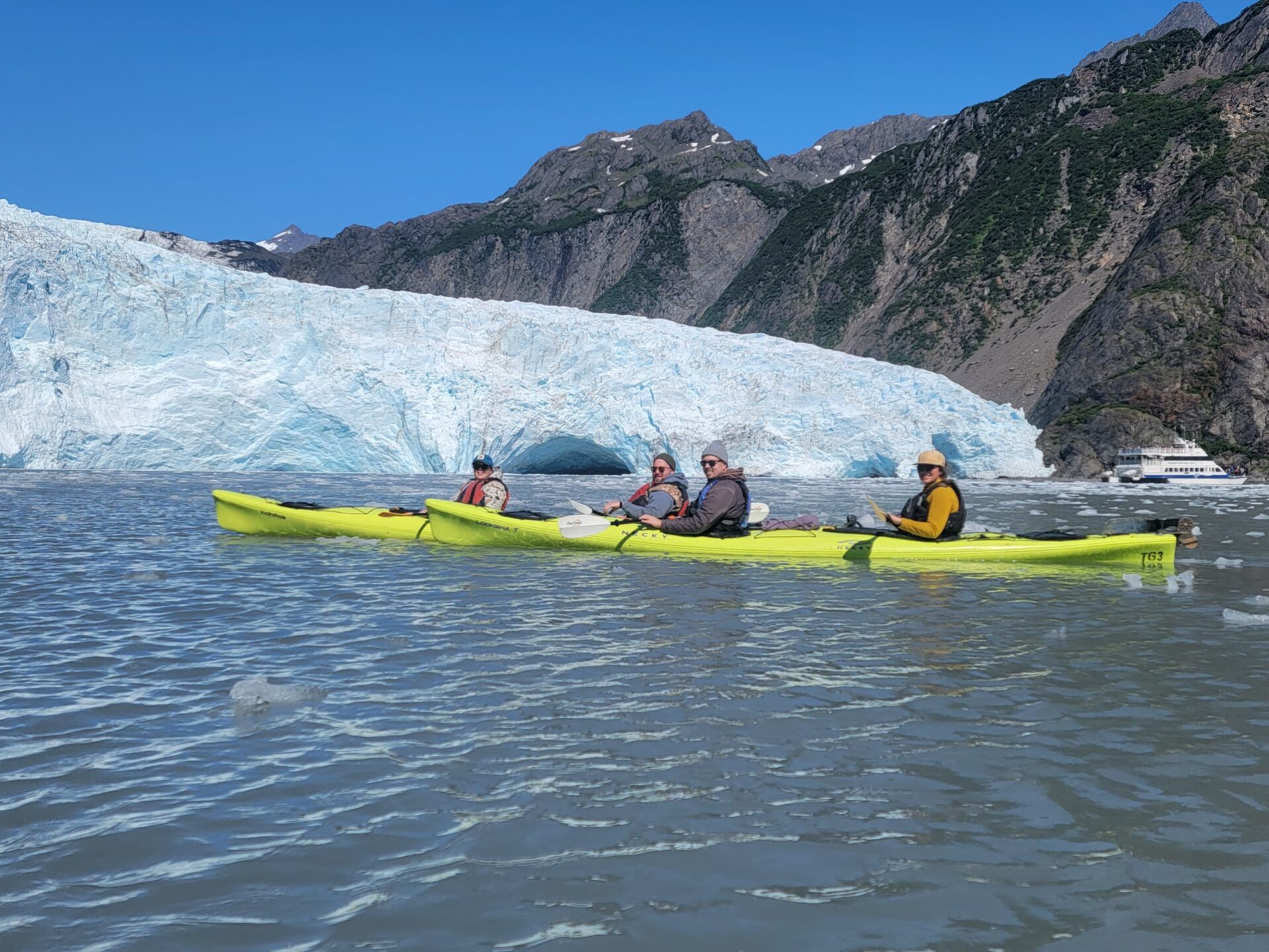 a group of people on a raft in a body of water