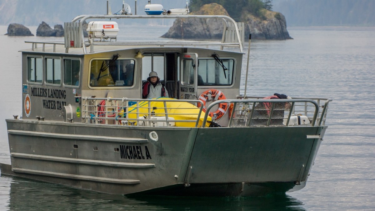a small boat in a body of water