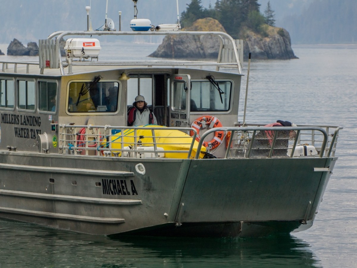 a small boat in a body of water
