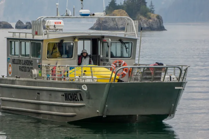 a small boat in a body of water