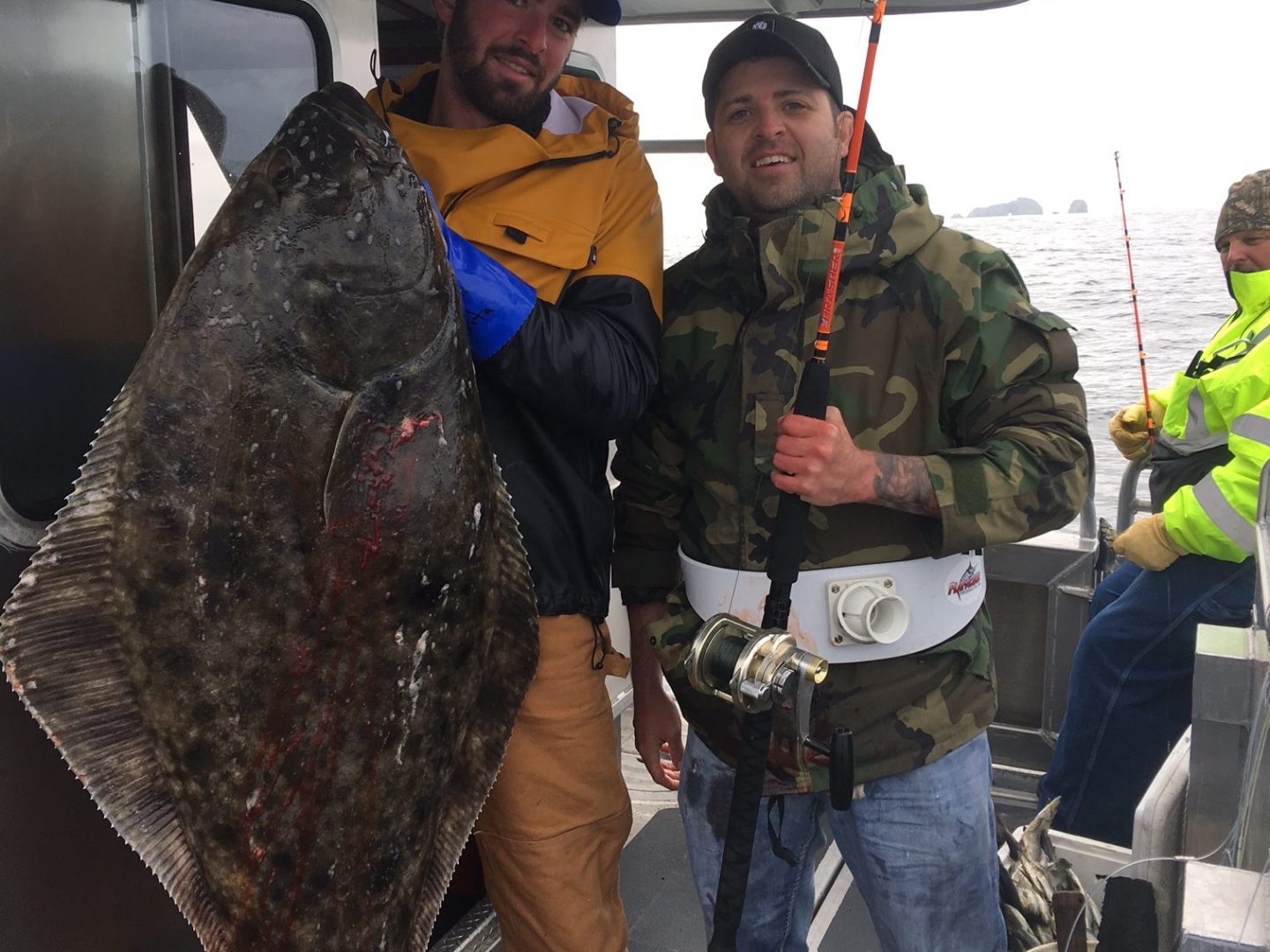 a person holding a fish