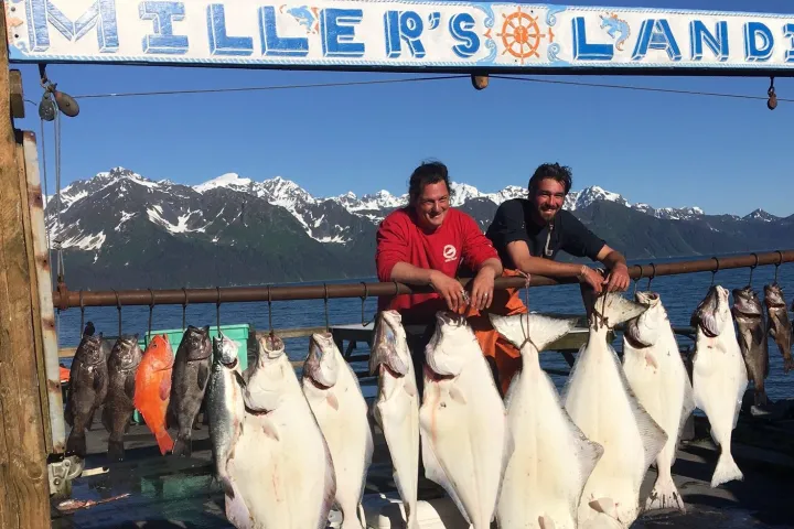 a group of people that are standing in the water