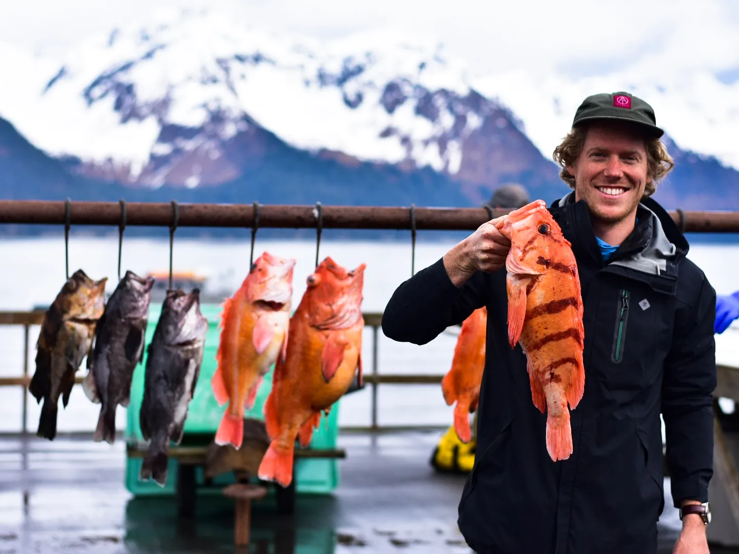 a person holding a fish