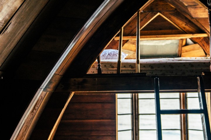 Bed infront of window overlooking the bay