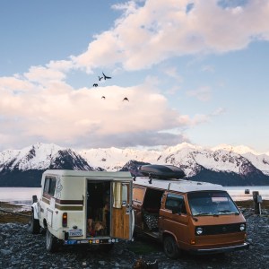 Camper vans parked in front of bay