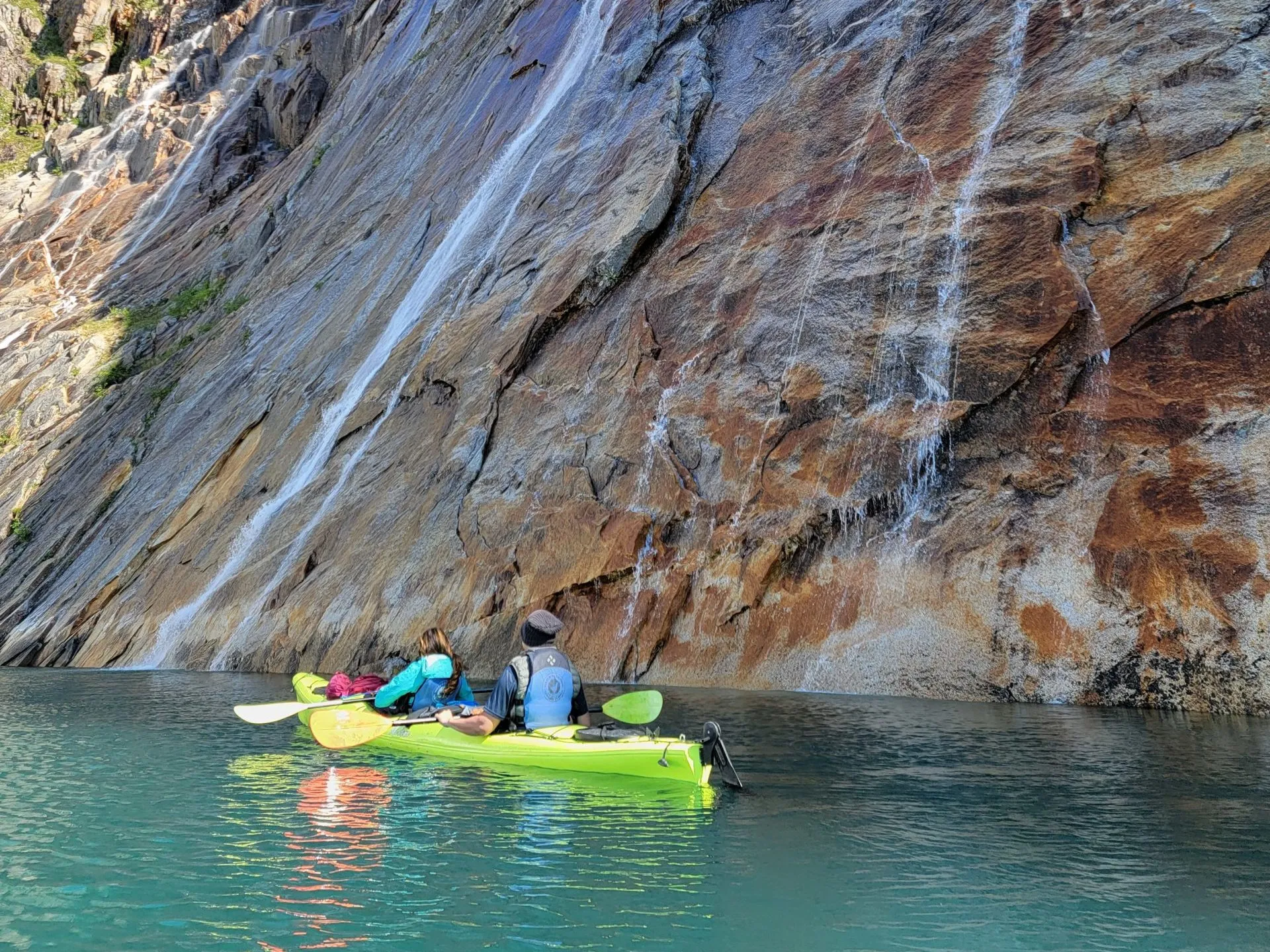 a group of people swimming in the water