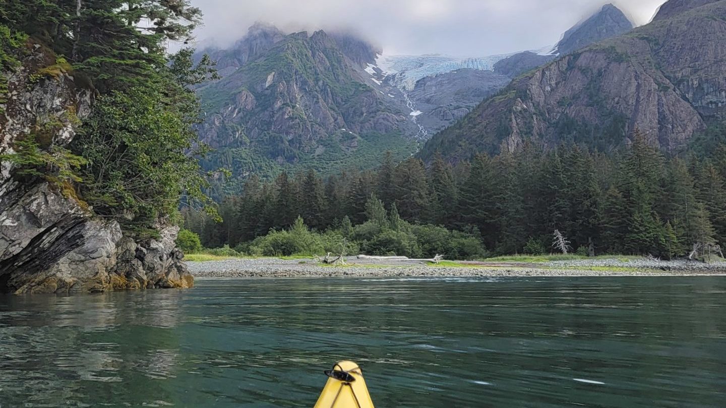 a small boat in a body of water