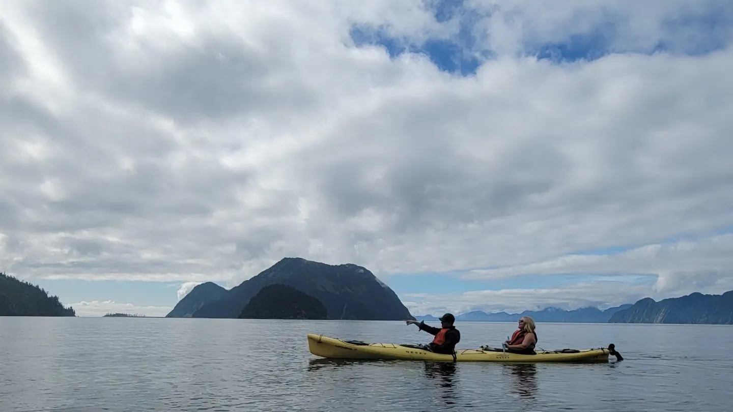 a boat sitting on top of a body of water