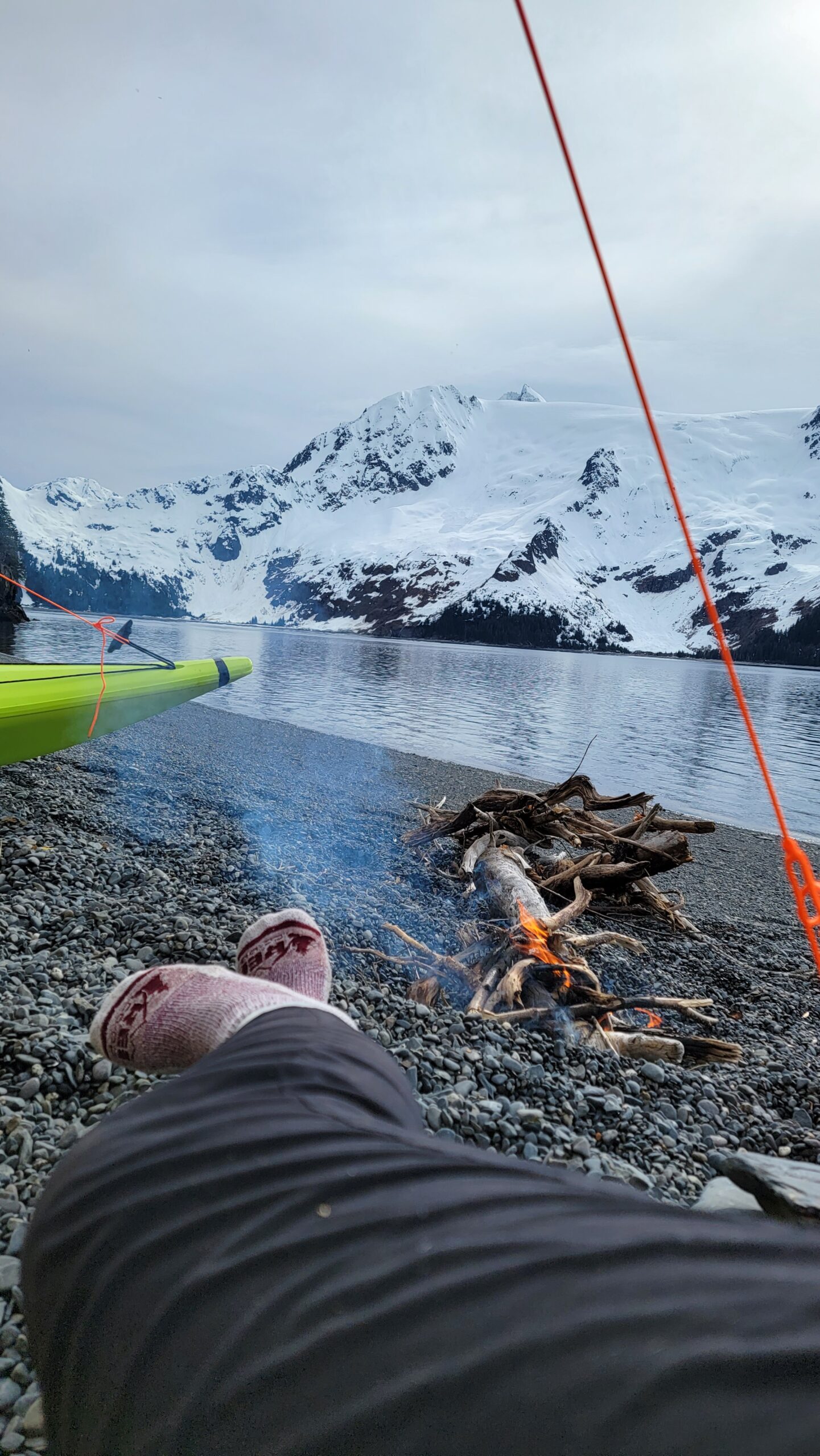 a man lying on the snow