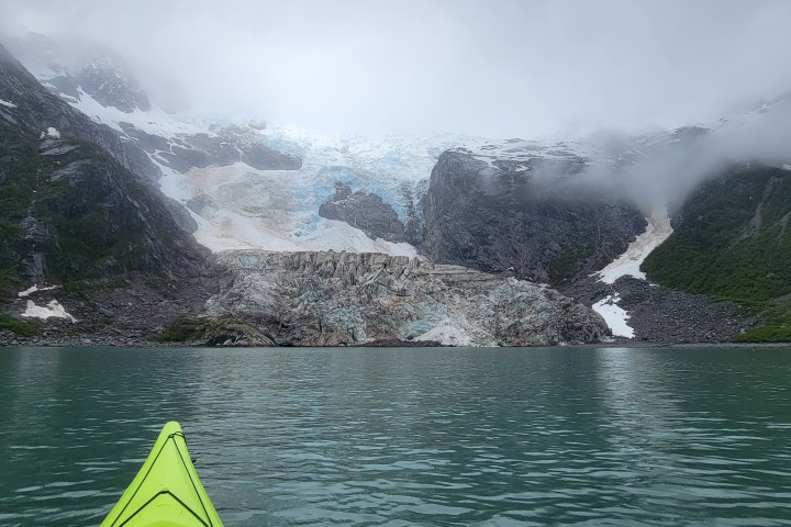 a lake with a mountain in the background