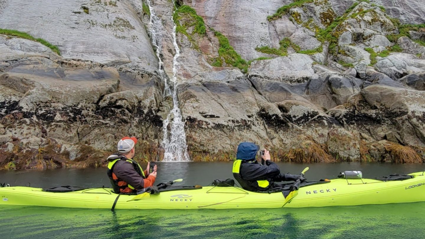a group of people on a raft