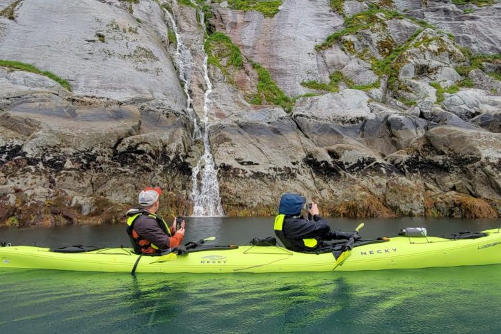 a group of people on a raft
