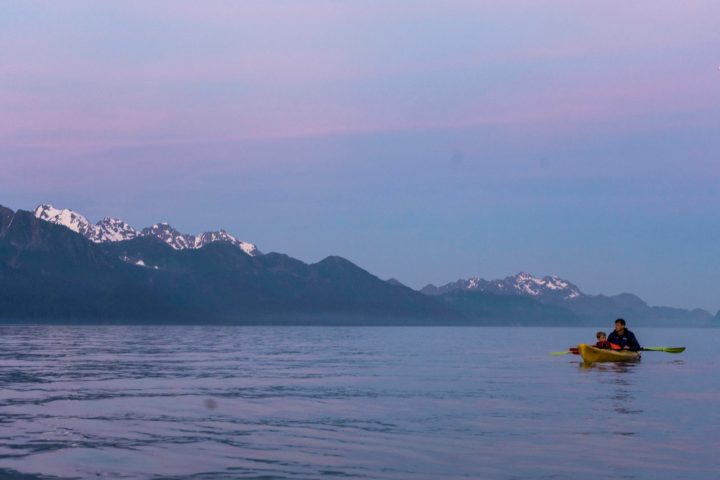 a small boat in a large body of water