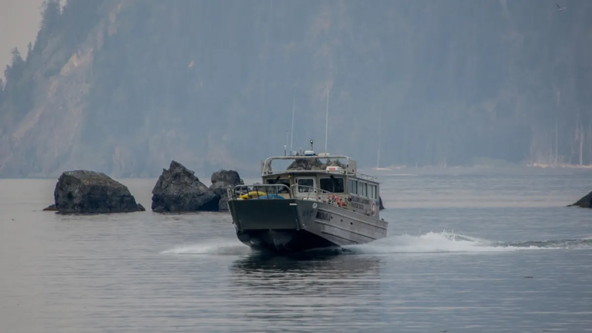 a small boat in a body of water