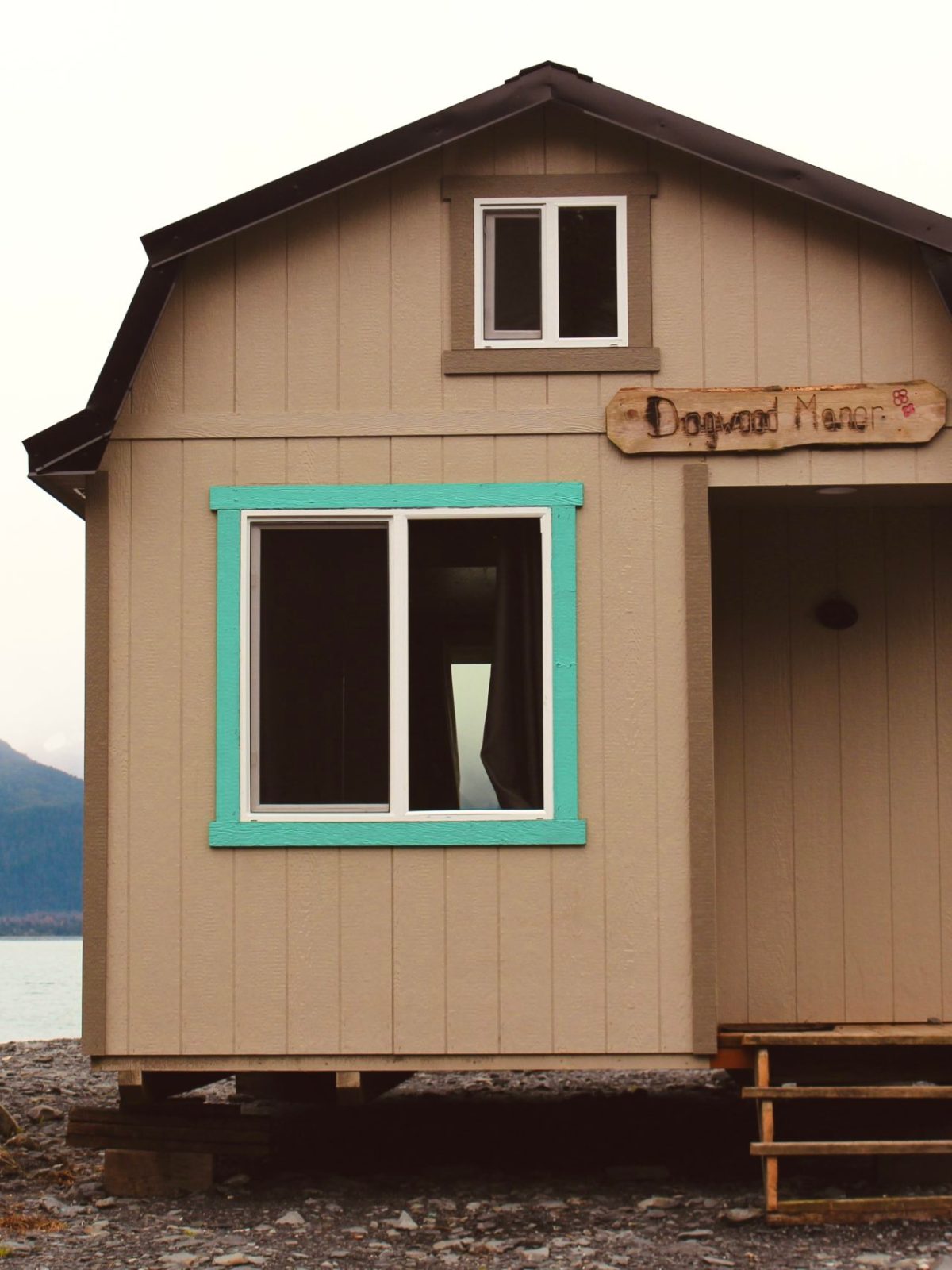 a house that is parked in front of a building