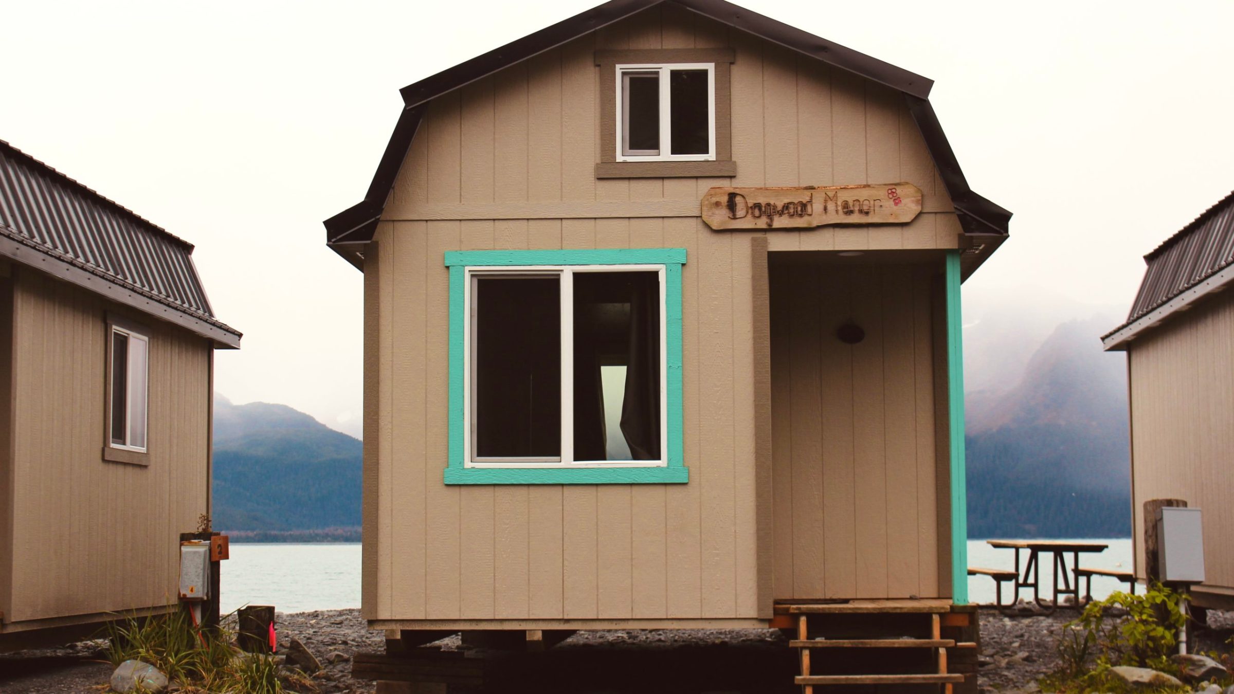 a house that is parked in front of a building