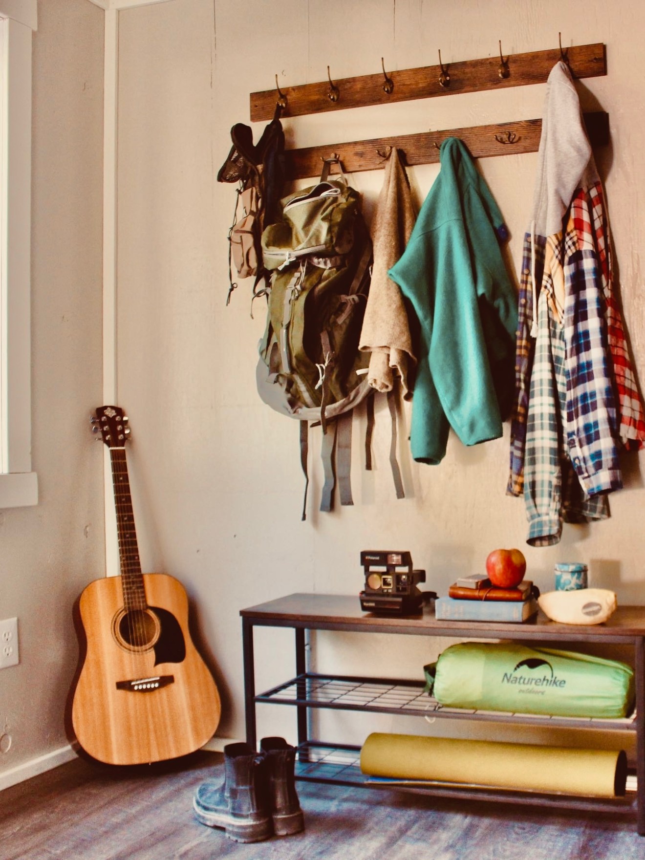 a room filled with furniture and a lamp