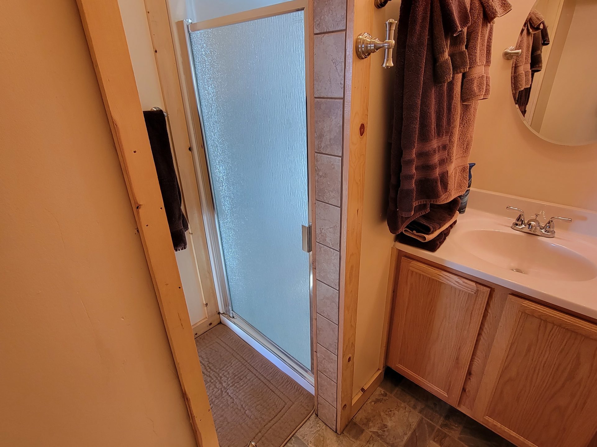 a room with a sink and a mirror