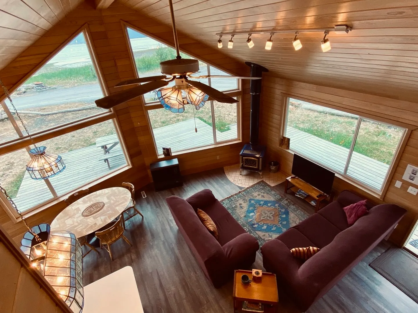 a living room filled with furniture and a fire place