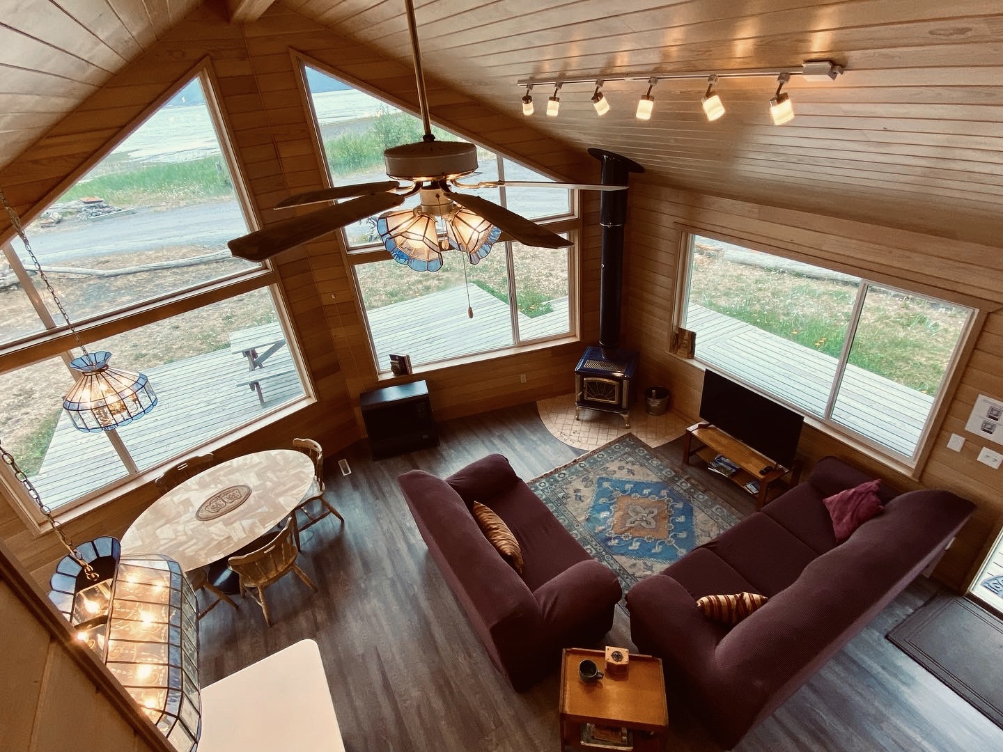 a living room filled with furniture and a fire place