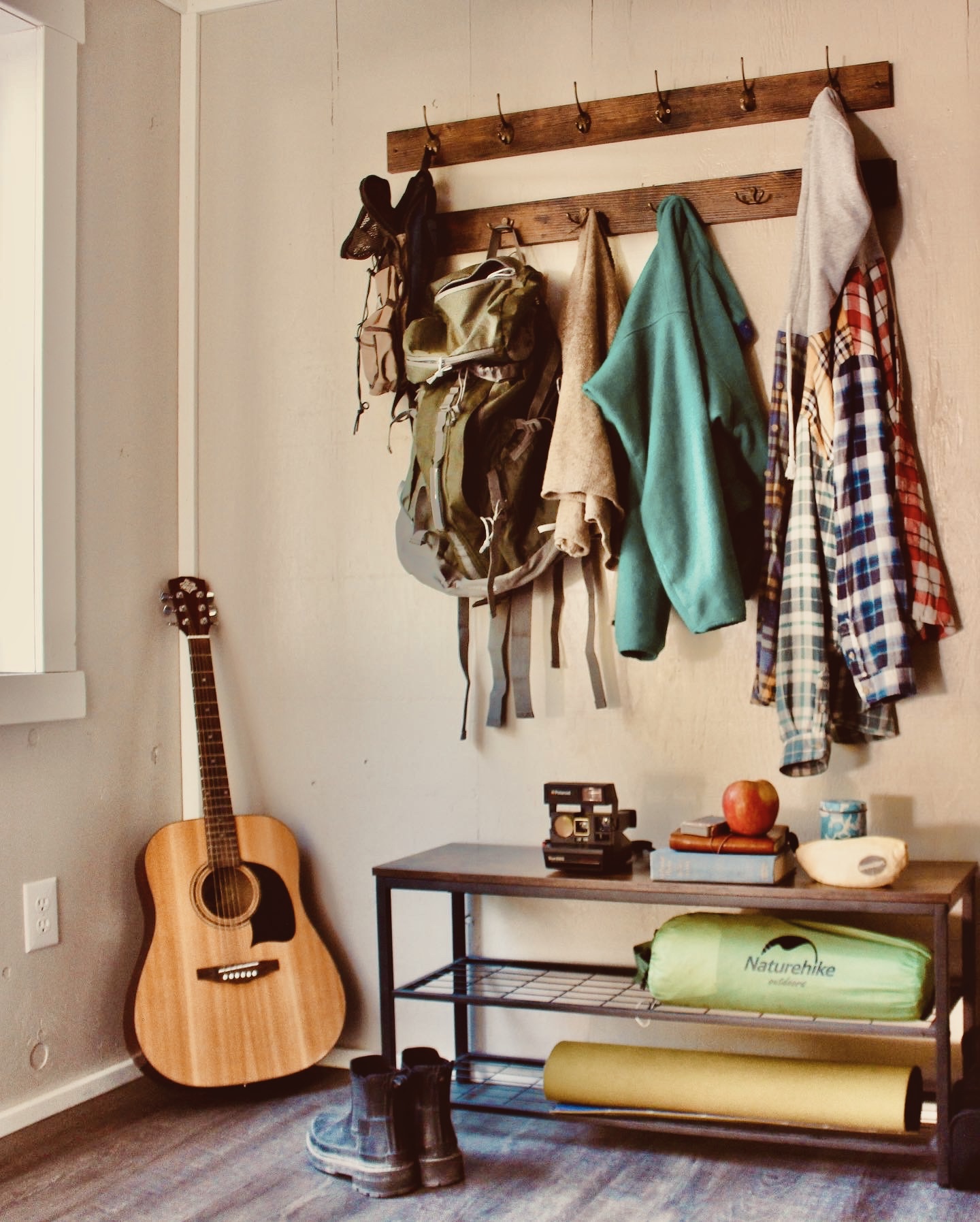 a room filled with furniture and a lamp