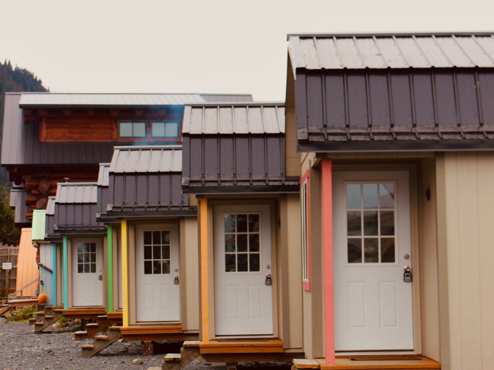 a house that is parked on the side of a building