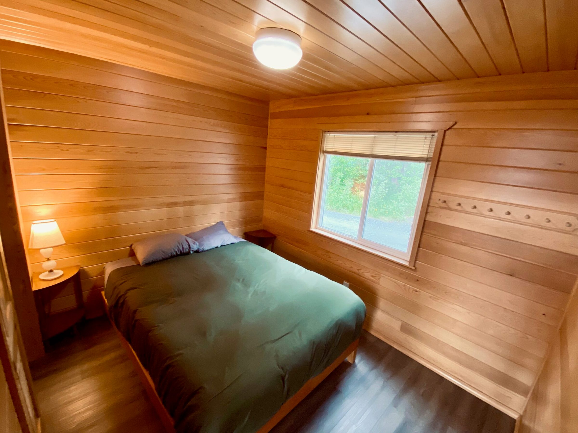 an empty bed in a room