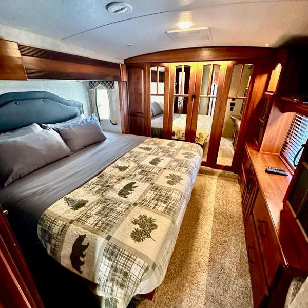 the master bedroom of the luxury camper of Oceanfront inn, a property managed by Millers Landing