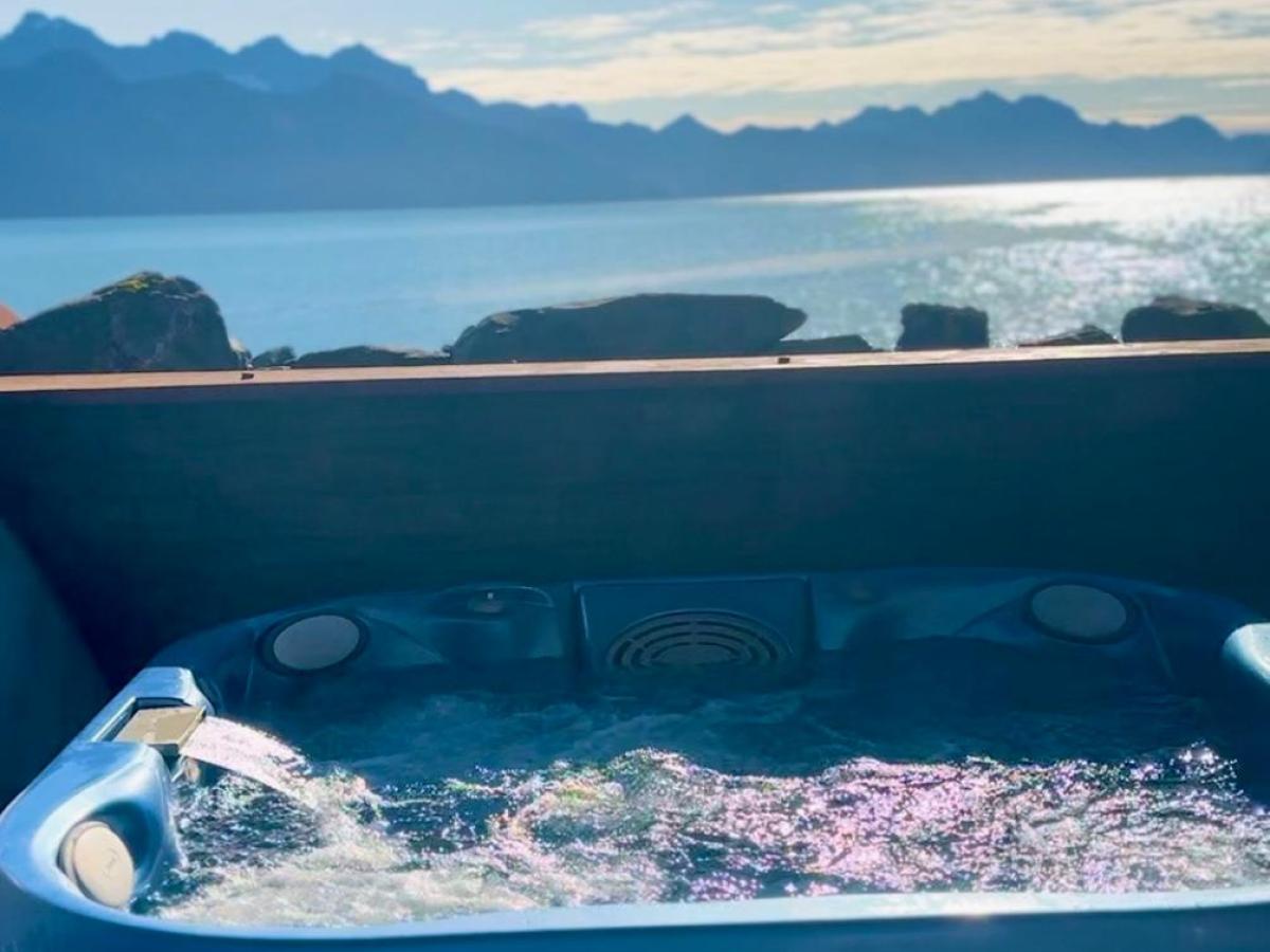 a view of the Resurrection Bay from the Hot tub of Oceanfront Inn managed by Millers Landing in Lowell Point, Seward Alaska