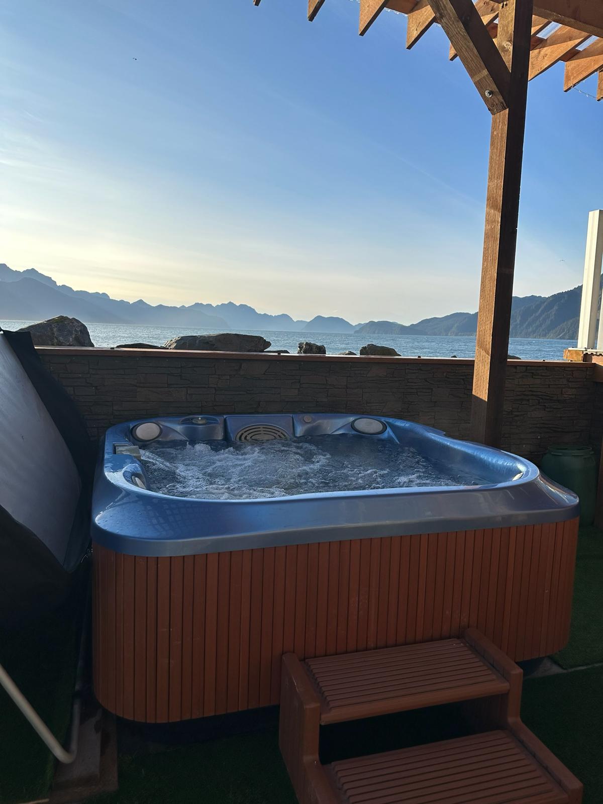 a view of the Resurrection Bay from the Hot tub of Oceanfront Inn managed by Millers Landing in Lowell Point, Seward Alaska