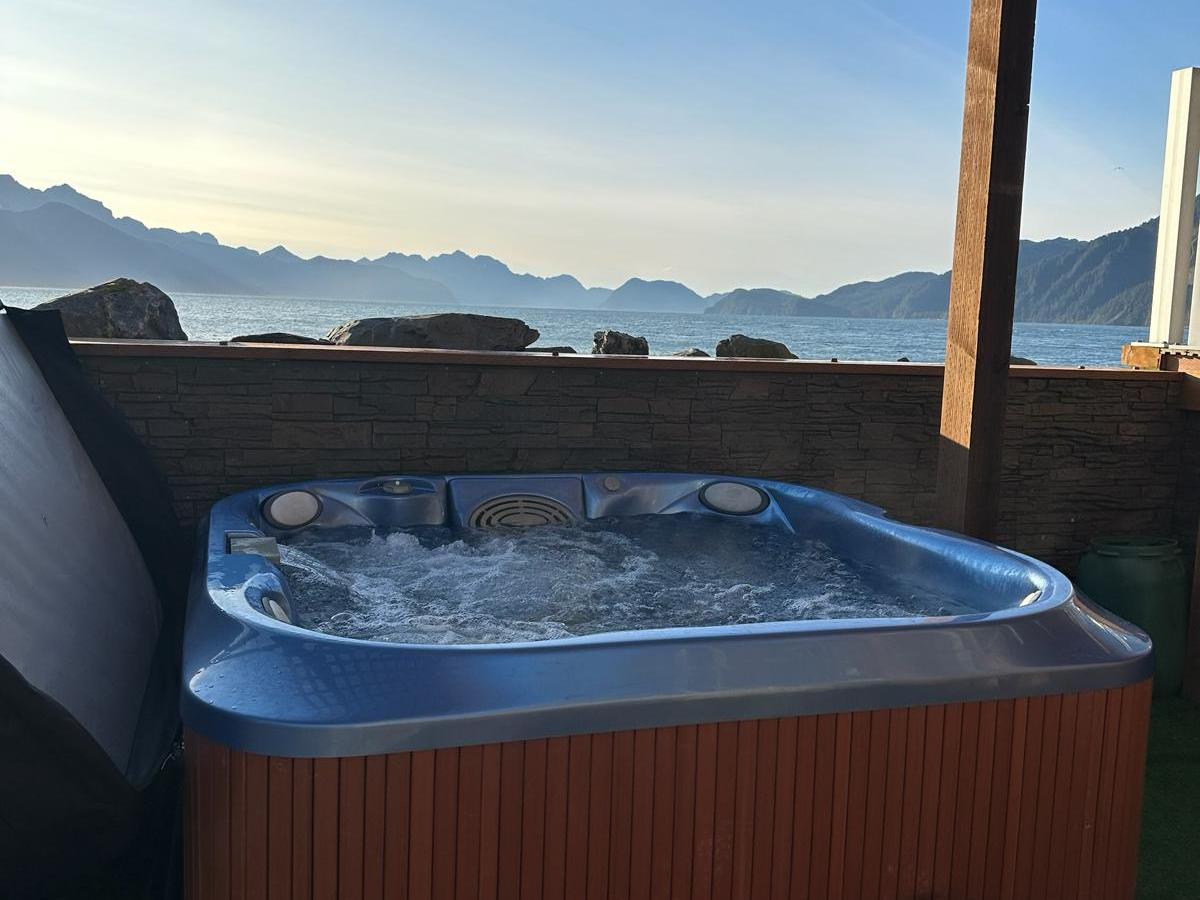 a view of the Resurrection Bay from the Hot tub of Oceanfront Inn managed by Millers Landing in Lowell Point, Seward Alaska