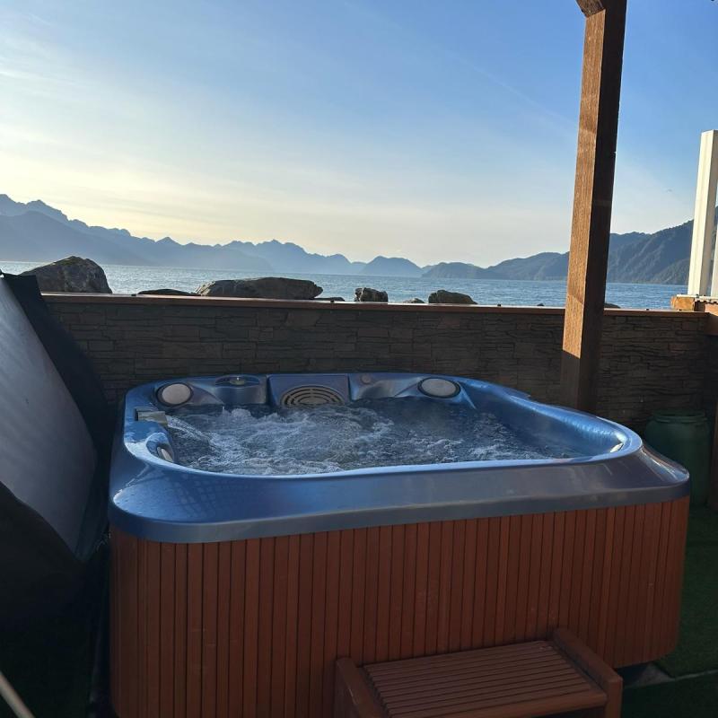 a view of the Resurrection Bay from the Hot tub of Oceanfront Inn managed by Millers Landing in Lowell Point, Seward Alaska