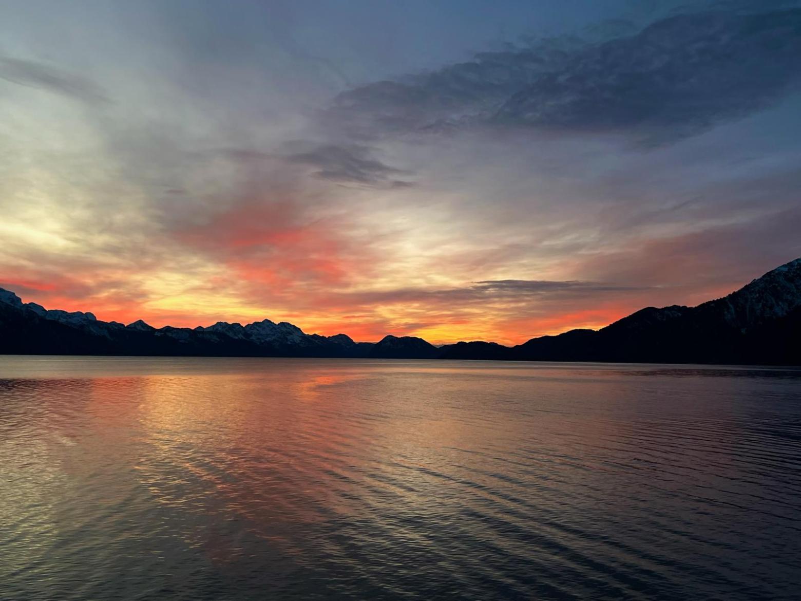 a sunset over a body of water