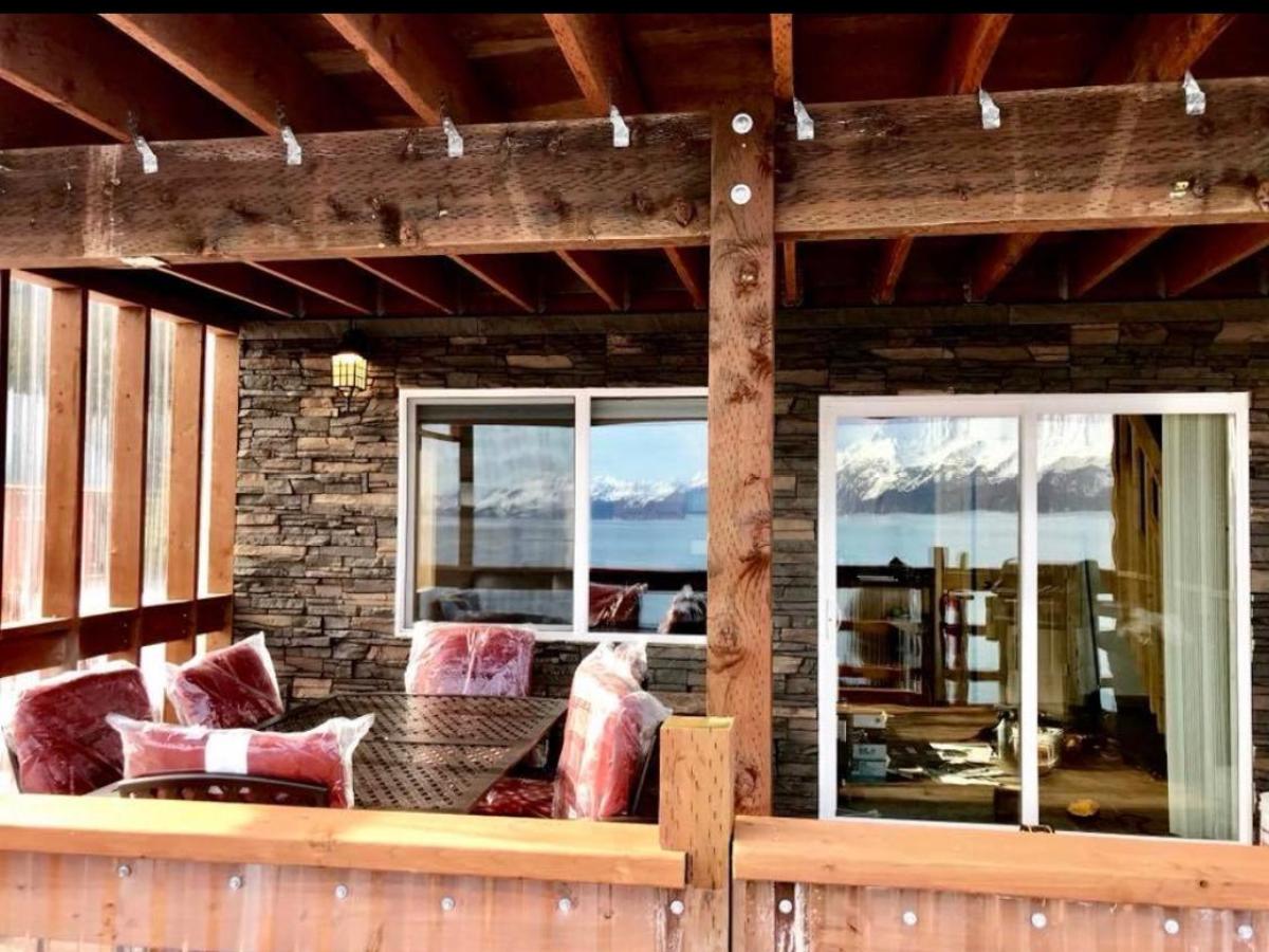 a room filled with furniture and a large window