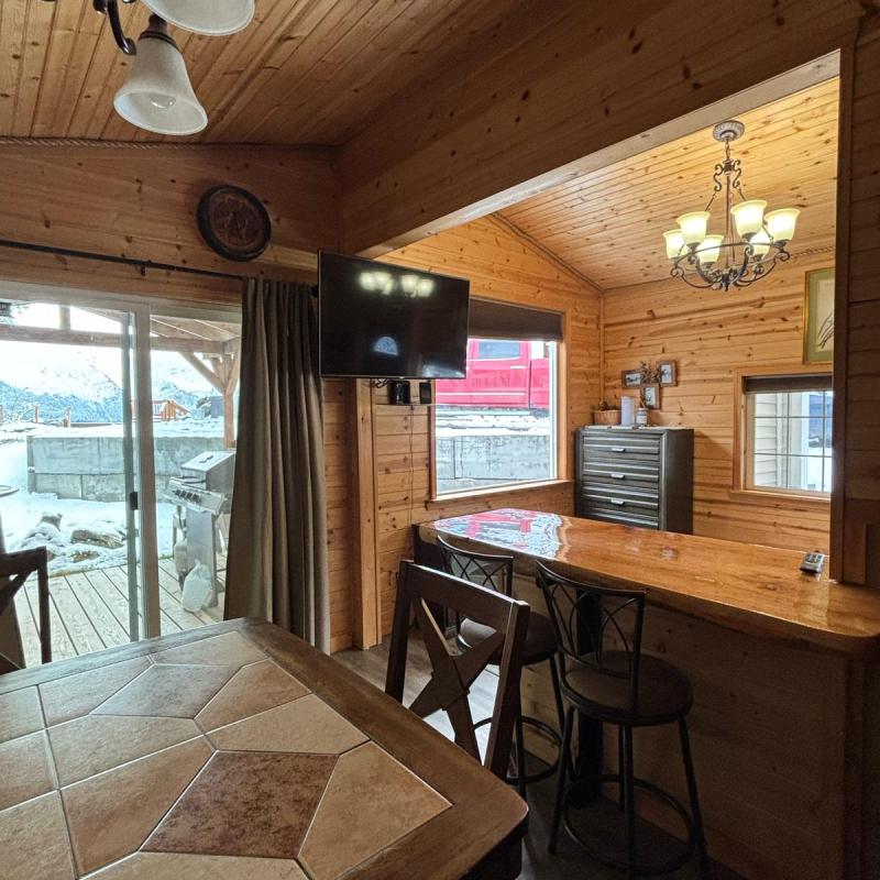a dining room table in front of a window