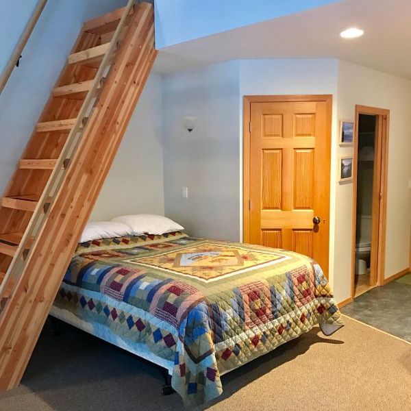 bed in the Aurora Skies Lodge