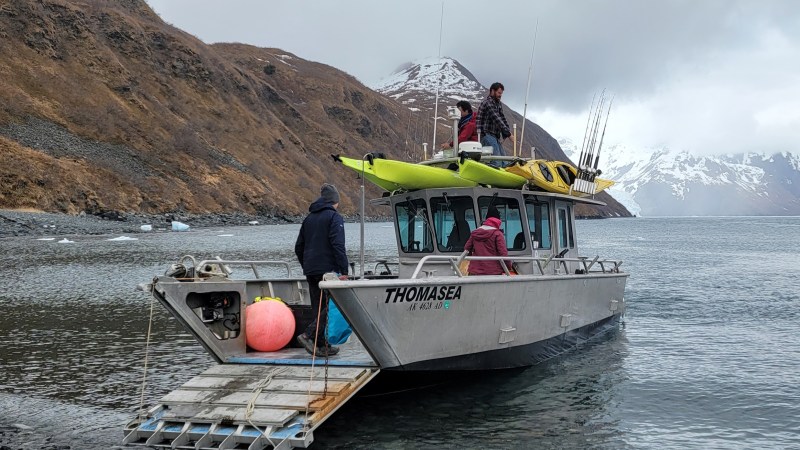 a boat sitting on top of a mountain