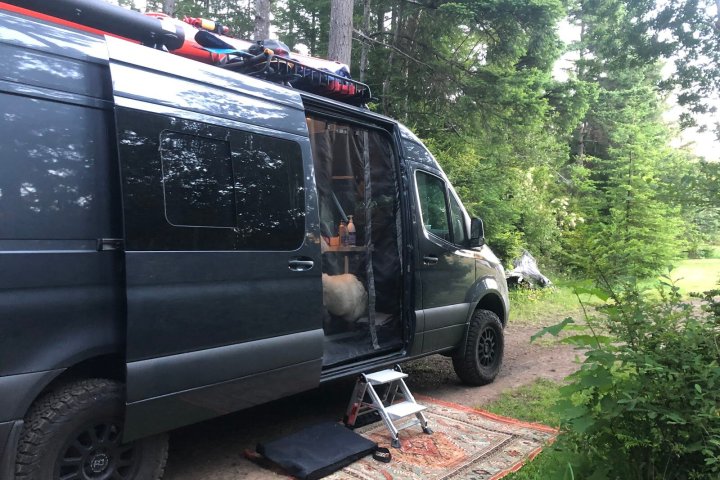 Sprinter Van parked on a campsite at Millers LandingMillers Landing Seward Alaska Beach Seaside