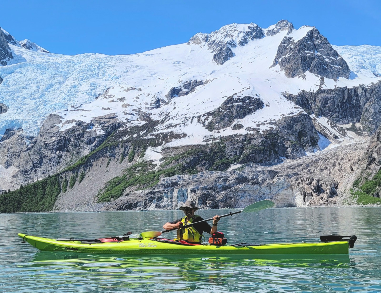 a man riding water skis on top of a mountain