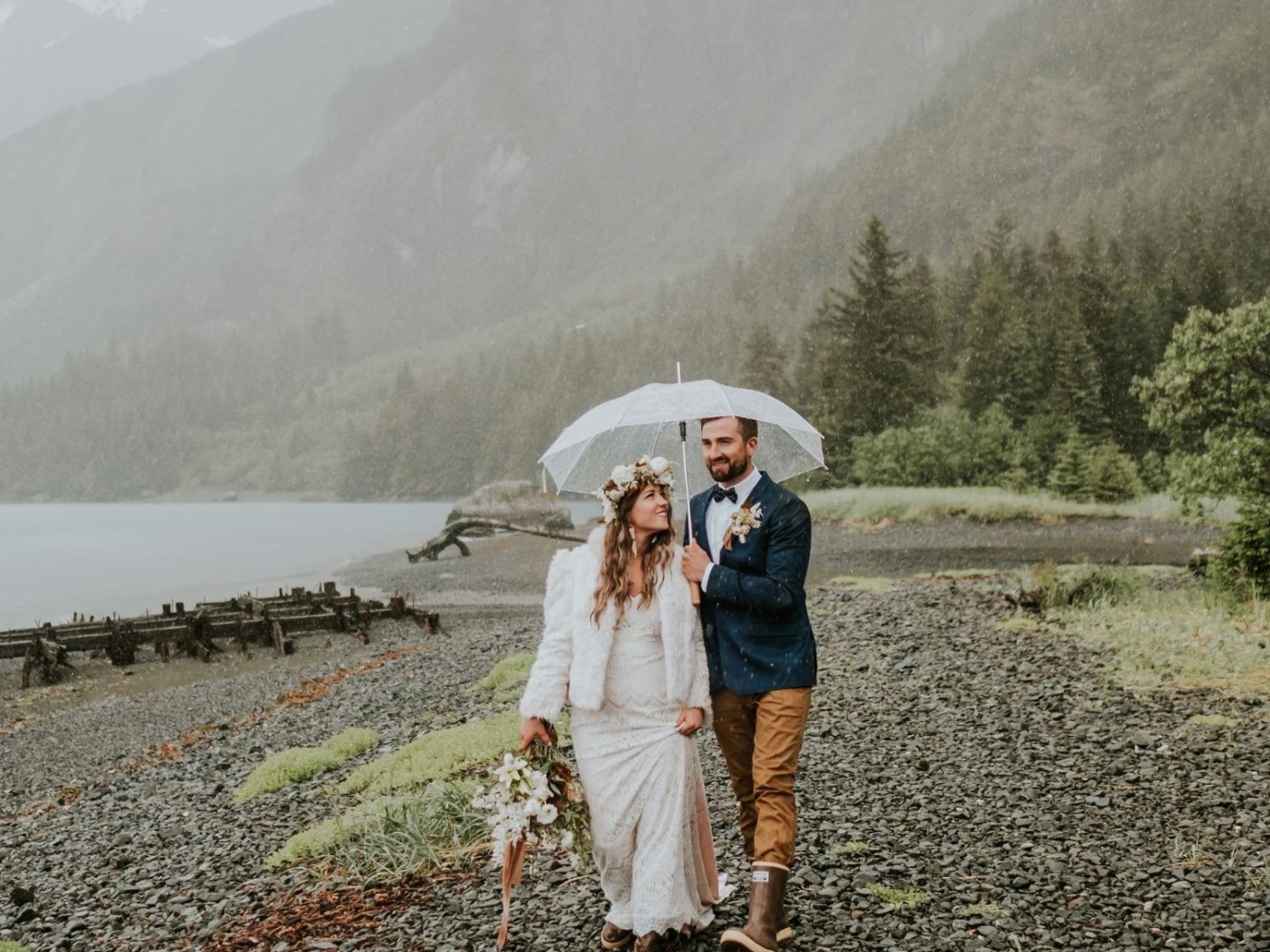 a man standing in front of a mountain