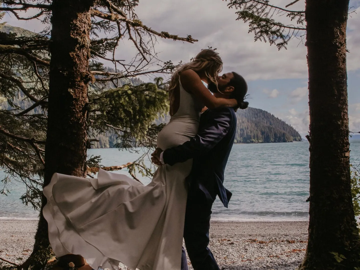 a person standing next to a tree